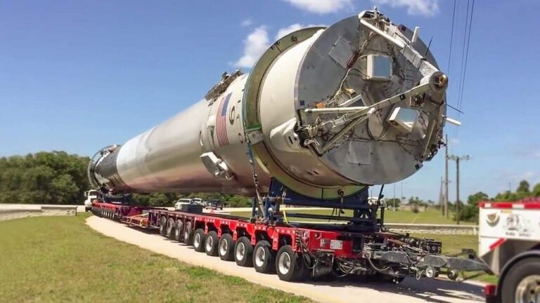 Falcon 9 rocket horizontal on the back of a transport truck
