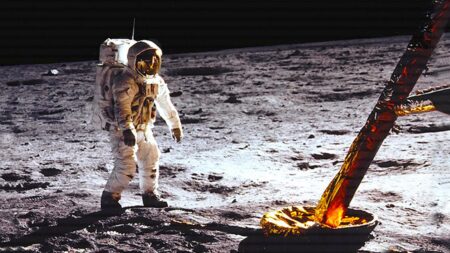 Buzz Aldrin standing on the Moon