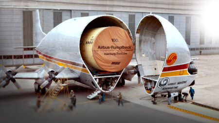 Airbus beluga transporting airplane fuselage