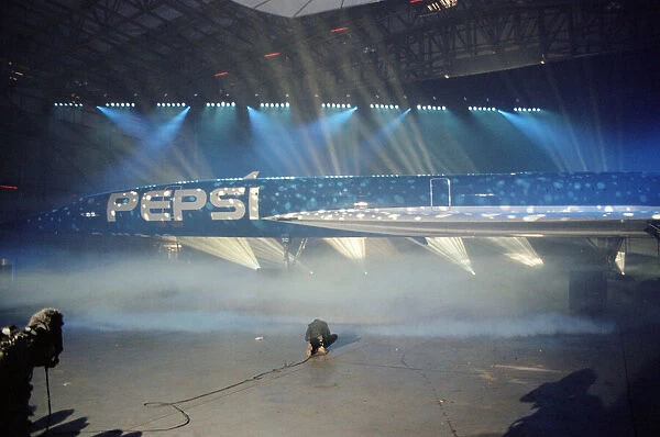 Blue Pepsi Concorde under the lights in a studio for the unveiling event